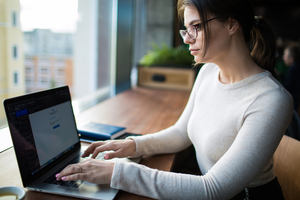 Woman,In,Glasses,With,Stylish,Look,Skilled,Marketing,Specialist,Checking